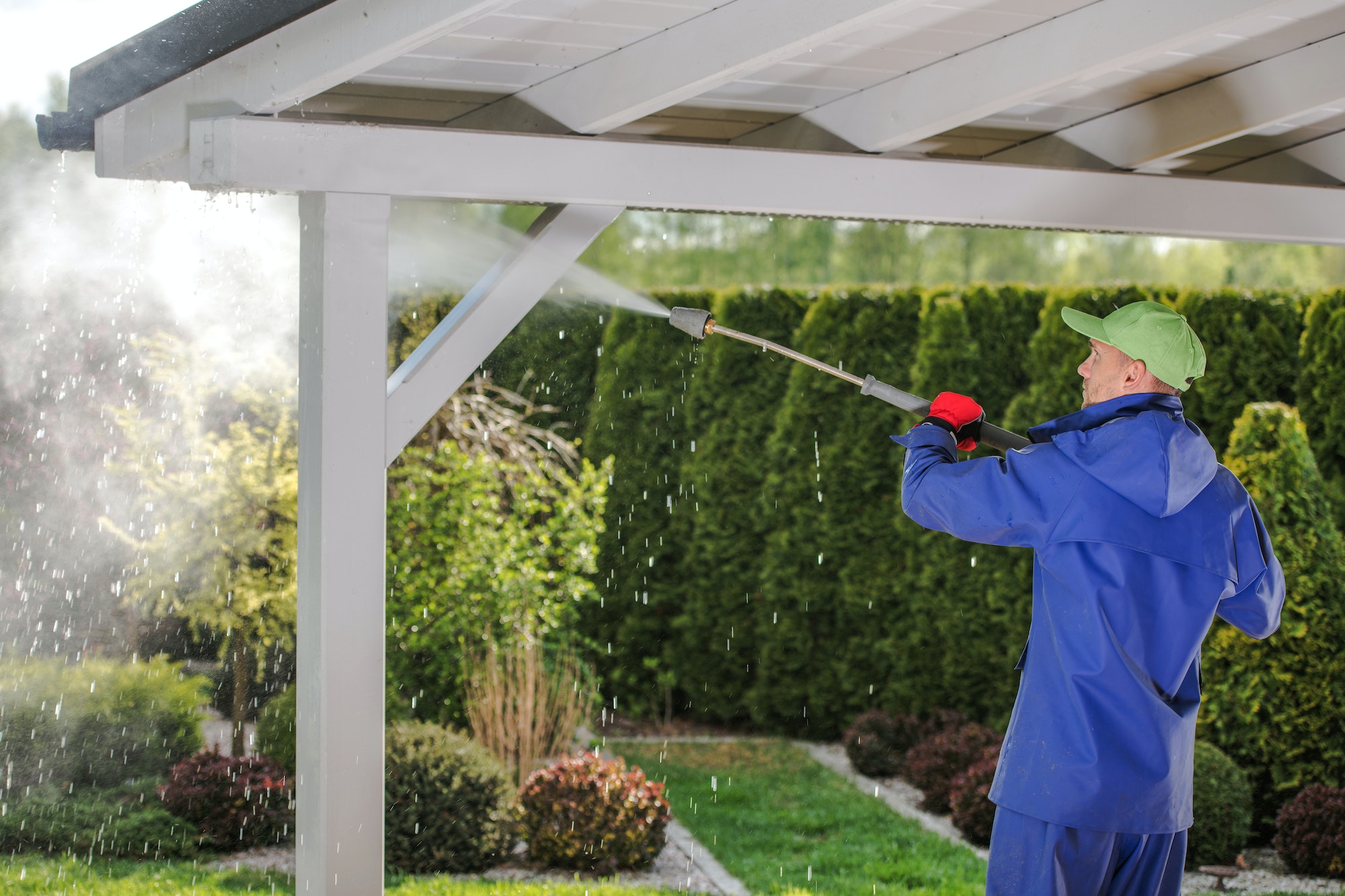 Men Pressure Washing Garden Porch Wooden Roof